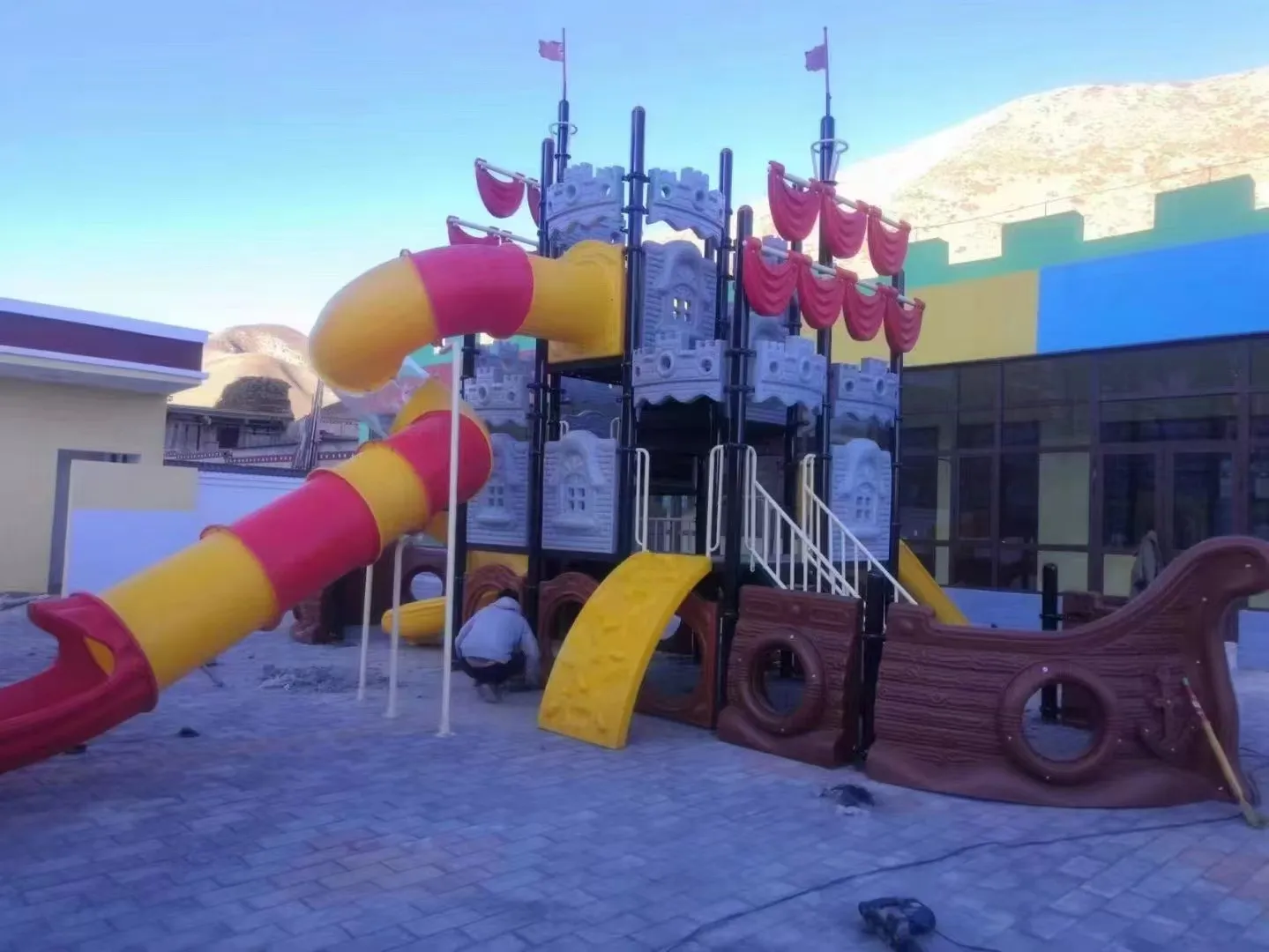 The Pirate Ship Slide blending medieval pirate ship aesthetics 